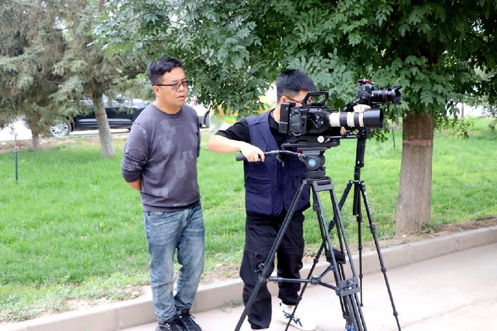 甘肃电视台专题采访百强民营企业甘肃565net必赢客户端牧业