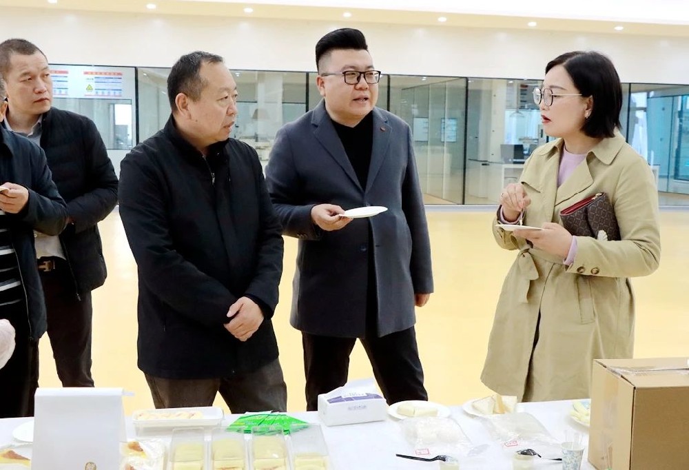 新疆生产建设兵团第七师126团到甘肃565net必赢客户端集团传祁甘味乳业参观考察