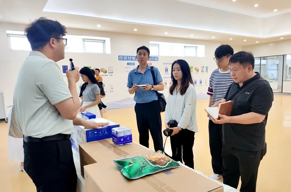 人民日报社“光影中国”调研组到甘肃传祁甘味乳业专题调研